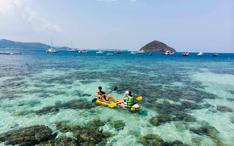 Dream Island fun on clear kayaks at Banana Beach