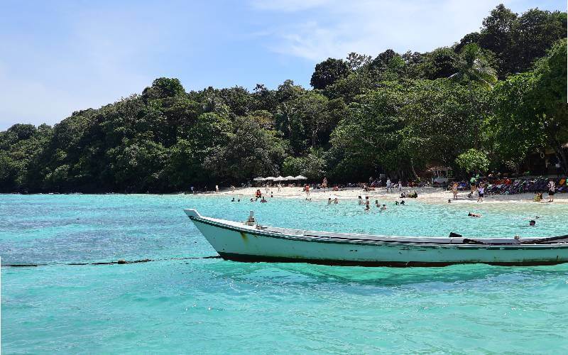 Navigate Phuket by longtail boats on the sea.